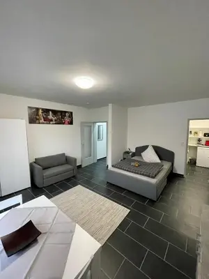 Ein Sitzbereich in der Unterkunft Urbanes Apartment Nähe ECE - Center & Schloss