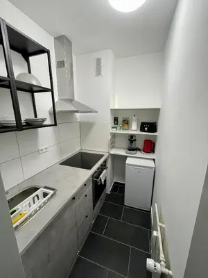 Küche/Küchenzeile in der Unterkunft Urbanes Apartment Nähe ECE - Center & Schloss