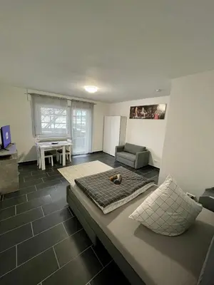 Ein Sitzbereich in der Unterkunft Urbanes Apartment Nähe ECE - Center & Schloss