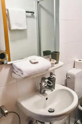Ein Badezimmer in der Unterkunft Land.Wein.Gut Pension
