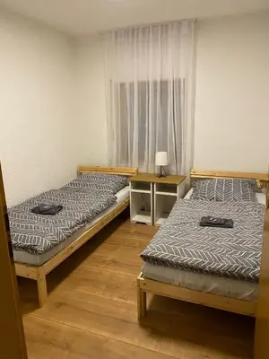 Ein Bett oder Betten in einem Zimmer der Unterkunft Ferienwohnung Schwabenheim an der Selz