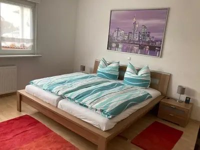 Ein Bett oder Betten in einem Zimmer der Unterkunft Ferienwohnung Gemütliches Eck
