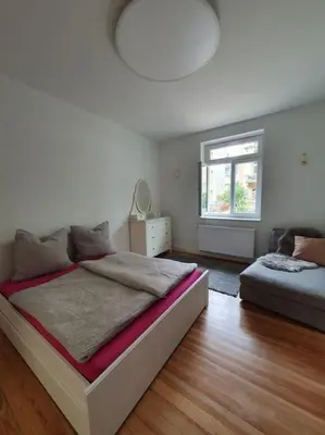 Ein Bett oder Betten in einem Zimmer der Unterkunft EG Weststadt Karlsruhe 4 Zimmer
