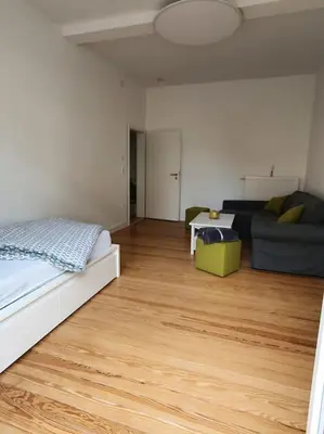 Ein Bett oder Betten in einem Zimmer der Unterkunft EG Weststadt Karlsruhe 4 Zimmer
