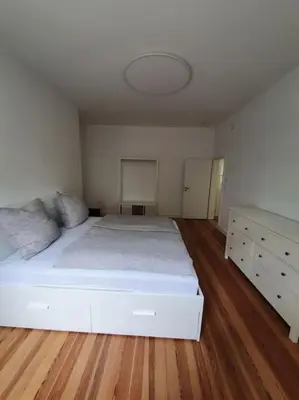 Ein Bett oder Betten in einem Zimmer der Unterkunft EG Weststadt Karlsruhe 4 Zimmer