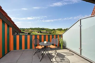 Ein Balkon oder eine Terrasse in der Unterkunft Wo der Hahn kräht