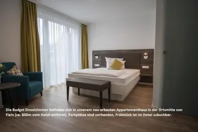 Ein Bett oder Betten in einem Zimmer der Unterkunft Wo der Hahn kräht