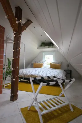 Ein Bett oder Betten in einem Zimmer der Unterkunft Idyllisches Wohnen in grüner Oase