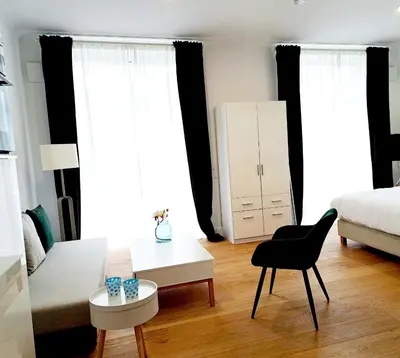 Ein Bett oder Betten in einem Zimmer der Unterkunft Stadtpalais am Schöntal