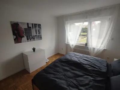Ein Bett oder Betten in einem Zimmer der Unterkunft Vogelnest - Wohlfühlen im Grünen