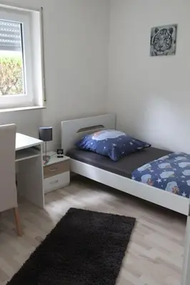Ein Bett oder Betten in einem Zimmer der Unterkunft Gästewohnung Pakulies