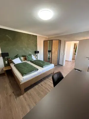 Ein Bett oder Betten in einem Zimmer der Unterkunft Gasthof Seeklause