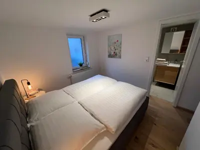 Ein Bett oder Betten in einem Zimmer der Unterkunft Apartmenthaus Wagner