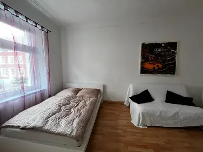 Ein Bett oder Betten in einem Zimmer der Unterkunft Altstadtperle-Herz der Altstadt
