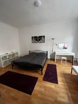 Ein Bett oder Betten in einem Zimmer der Unterkunft Altstadtperle-Herz der Altstadt