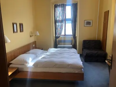 Ein Bett oder Betten in einem Zimmer der Unterkunft Gasthaus Klosterhof