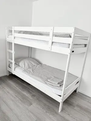 Ein Bett oder Betten in einem Zimmer der Unterkunft Moderne 3-Zimmer-Ferienwohnung bei Frankfurt - frisch renoviert, zentral gelegen und perfekt für Familien und Business-Trips