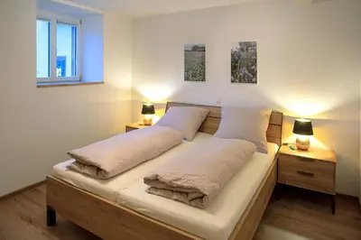 Ein Bett oder Betten in einem Zimmer der Unterkunft Ferienwohnungen - Gutshof Dürrhof