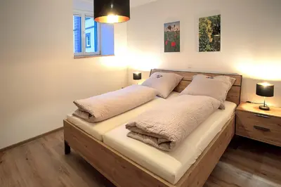Ein Bett oder Betten in einem Zimmer der Unterkunft Ferienwohnungen - Gutshof Dürrhof