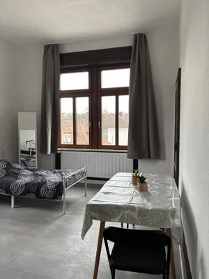 Ein Bett oder Betten in einem Zimmer der Unterkunft 1 Zimmer für 2 Personen Bruchsal ruhige Lage (Monteurzimmer)