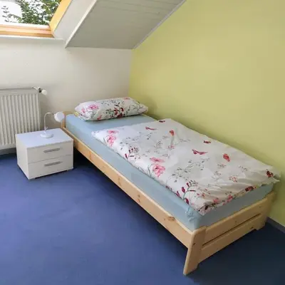 Ein Bett oder Betten in einem Zimmer der Unterkunft Wohnung mit Weitblick