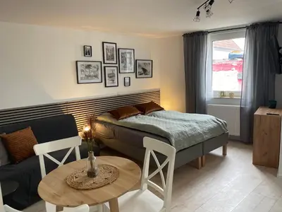 Ein Bett oder Betten in einem Zimmer der Unterkunft Freigeist Apartments