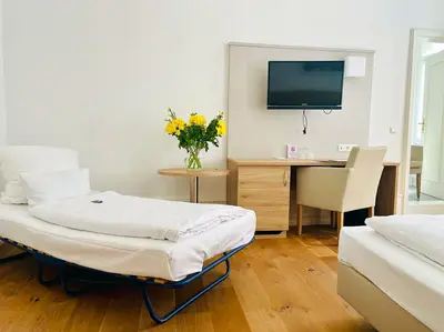 Ein Bett oder Betten in einem Zimmer der Unterkunft Hotel Perkeo