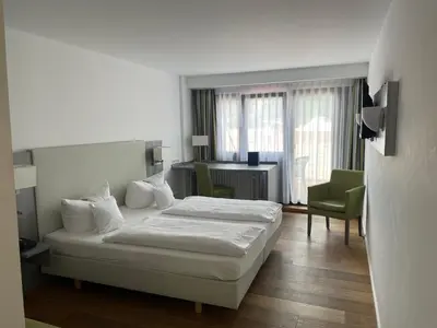 Ein Bett oder Betten in einem Zimmer der Unterkunft Hotel am Schloss
