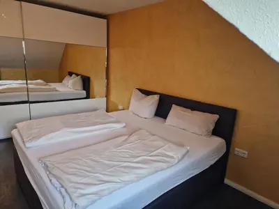 Ein Bett oder Betten in einem Zimmer der Unterkunft Wohnen auf Zeit City Speyer