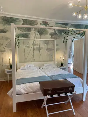 Ein Bett oder Betten in einem Zimmer der Unterkunft Gästehaus Schloss Janson