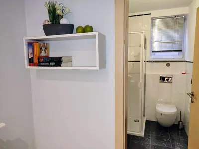 Ein Badezimmer in der Unterkunft Ferienwohnung An der Korkeiche