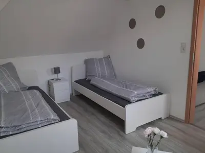 Ein Bett oder Betten in einem Zimmer der Unterkunft Willkommen in Weisenheim am Sand