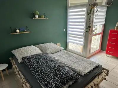 Ein Bett oder Betten in einem Zimmer der Unterkunft Wohnung Emilia