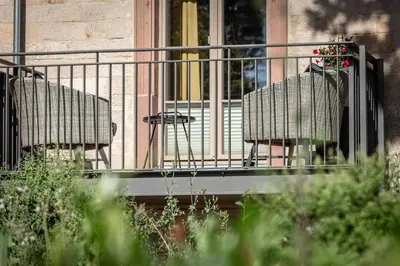 Ein Balkon oder eine Terrasse in der Unterkunft Acapella Suite Allegro 76qm I Altstadt l Weinberg