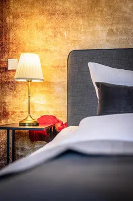 Ein Bett oder Betten in einem Zimmer der Unterkunft Acapella Suite Allegro 76qm I Altstadt l Weinberg