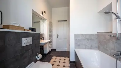 Ein Badezimmer in der Unterkunft Acapella Suite Allegro 76qm I Altstadt l Weinberg