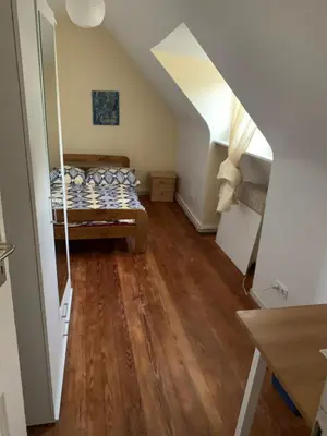 Ein Bett oder Betten in einem Zimmer der Unterkunft Burgfreiheit