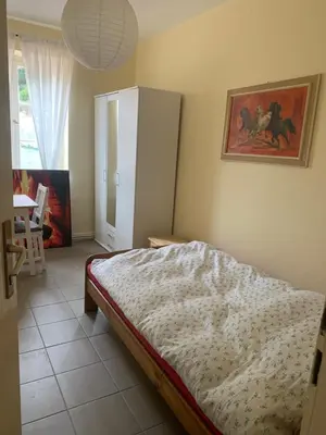 Ein Bett oder Betten in einem Zimmer der Unterkunft Burgfreiheit