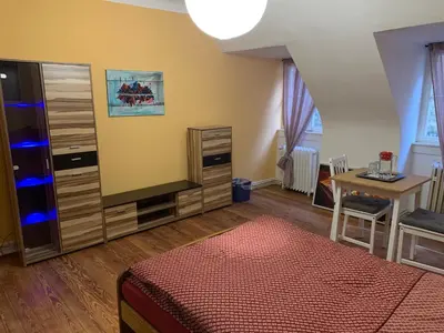 Ein Bett oder Betten in einem Zimmer der Unterkunft Burgfreiheit