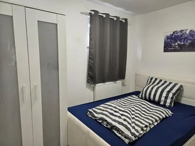 Ein Bett oder Betten in einem Zimmer der Unterkunft Gemütliche Wohnung in Happenbach