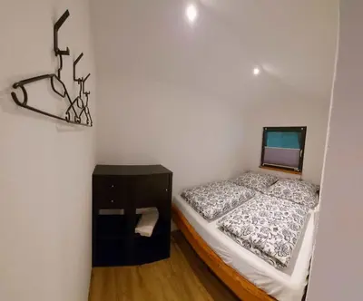 Ein Bett oder Betten in einem Zimmer der Unterkunft Ferienhaus: Mitten auf dem Reiterhof