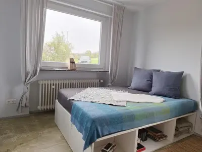 Ein Bett oder Betten in einem Zimmer der Unterkunft Ausblick Maisenbach