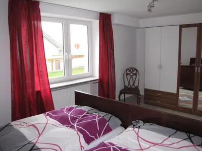Ein Bett oder Betten in einem Zimmer der Unterkunft Haus Biengarten