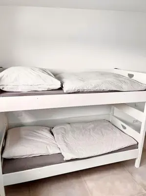 Ein Bett oder Betten in einem Zimmer der Unterkunft Ferienwohnung Lili