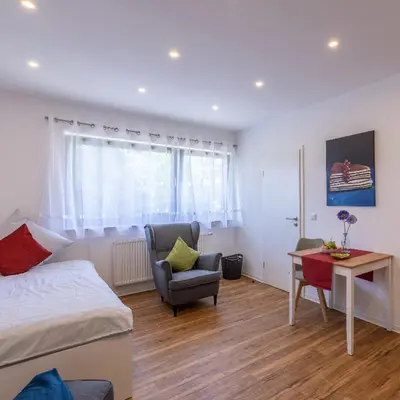 Ein Bett oder Betten in einem Zimmer der Unterkunft IMMOCITY Apartments