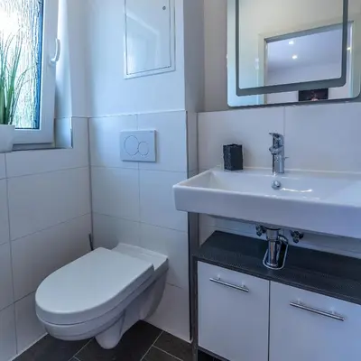 Ein Badezimmer in der Unterkunft IMMOCITY Apartments