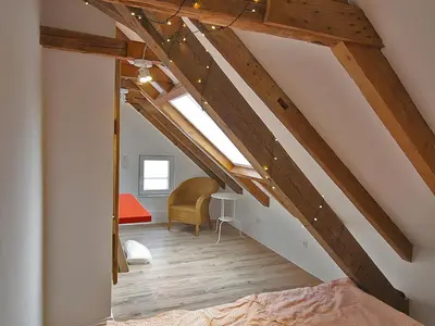 Ein Bett oder Betten in einem Zimmer der Unterkunft Maisonette-Wohnung mit großer Terrasse - 11a - a86223