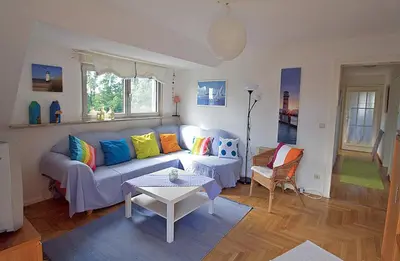 Ein Sitzbereich in der Unterkunft Ferienwohnung 11 mit großer Terrasse am Privatsee