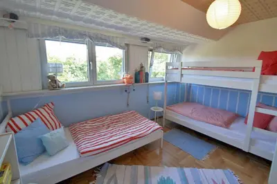 Ein Bett oder Betten in einem Zimmer der Unterkunft Ferienwohnung 11 mit großer Terrasse am Privatsee