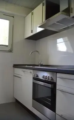 Küche/Küchenzeile in der Unterkunft Ferienhaus in Waldkatzenbach modern & renoviert
